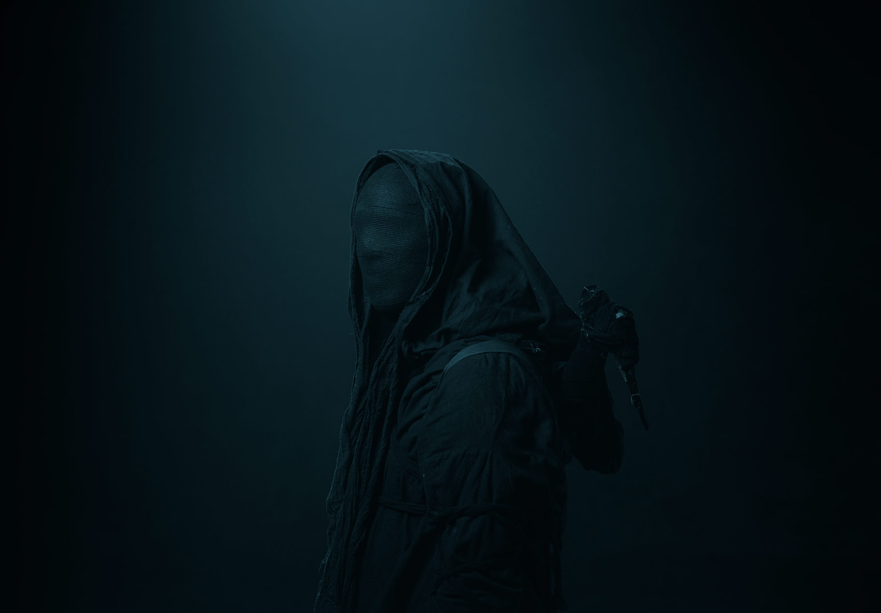 Portrait of a masked hooded man. Concept art for the hip hop group Hemmelig Sekt. 